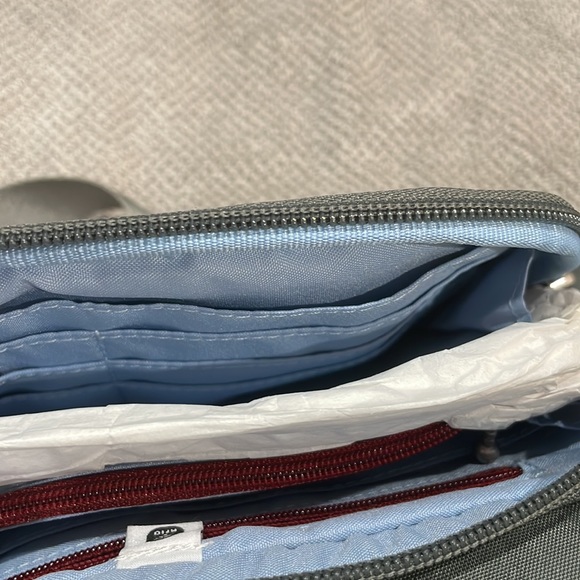 Baggallini. Brand new with tags. Grey with subtle cheetah print background. - Picture 8 of 12